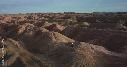 Dirtbikers Riding in Hills  photo