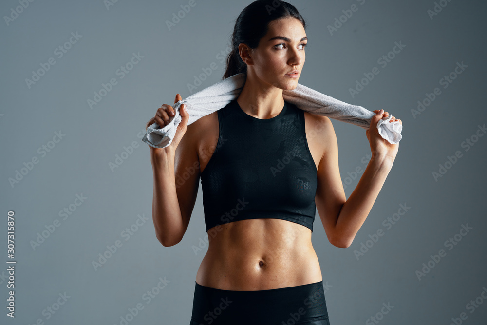 young woman with dumbbells