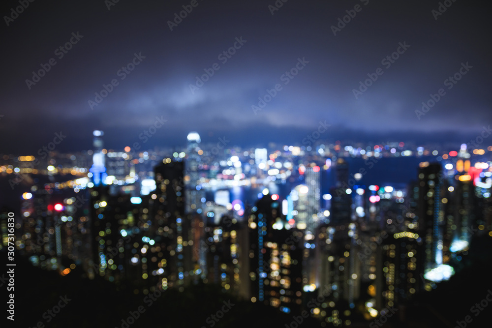 View of the night modern city - Out of focus. Bokeh lights.