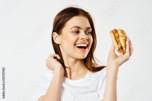 young woman with hamburger