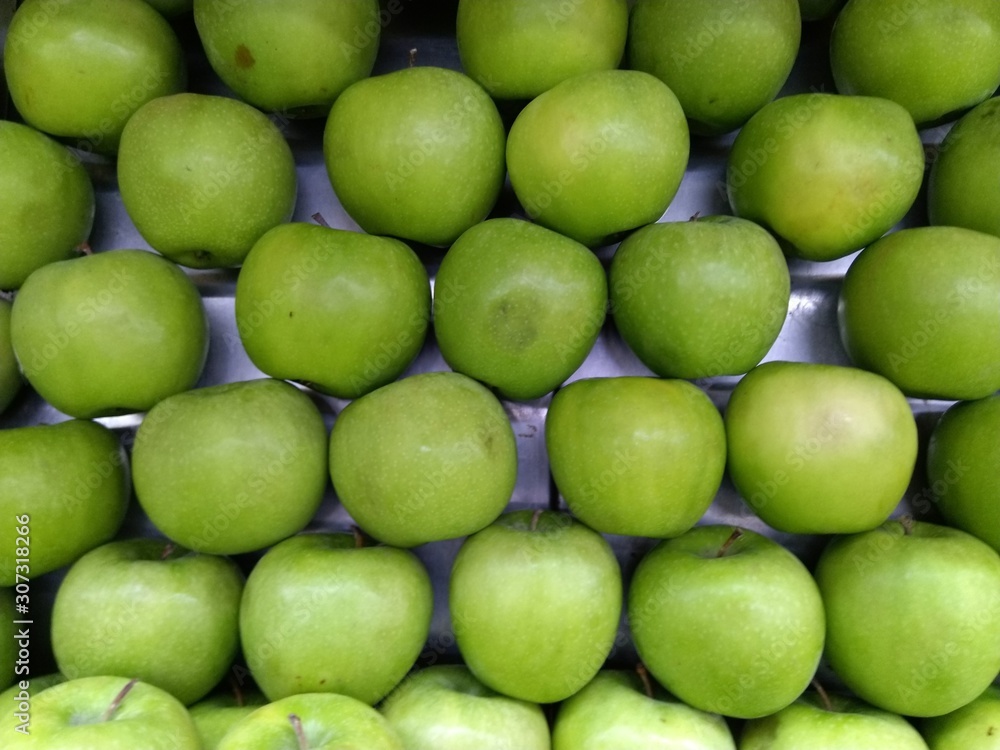 apples on green background apples on green background