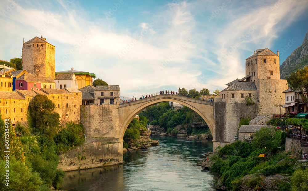 Mostar, Bosnia and Herzegovina,The Old Bridge, Stari Most, with river Neretva - obrazy, fototapety, plakaty 