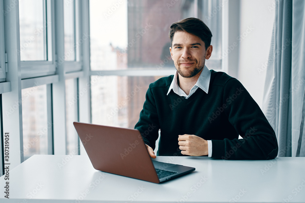 businessman working on laptop in office businessman working on laptop in office