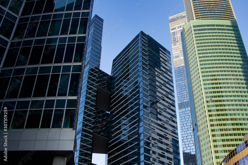 Modern skyscrapers in business district in evening light at sunset