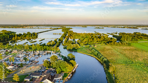 Vászonkép Aerial drone view of typical Dutch landscape with canals, polder water, green fi