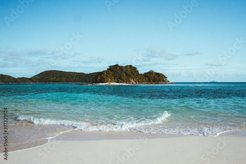 Philippines El nido , Palawan white sand beach without people, blue sky , turquoise water wide angle shot.