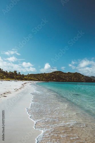 Philippines El nido   Palawan white sand beach without people  blue sky   turquoise water wide angle shot.