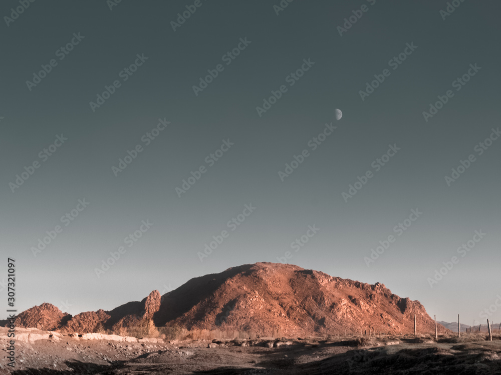 red rock and moon, beautiful toned image