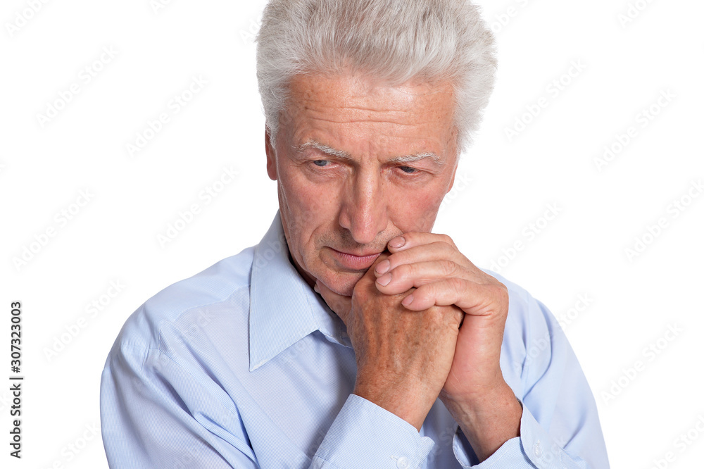 Close up portrait of sad senior man isolated on white background Close up portrait of sad senior man isolated on white background