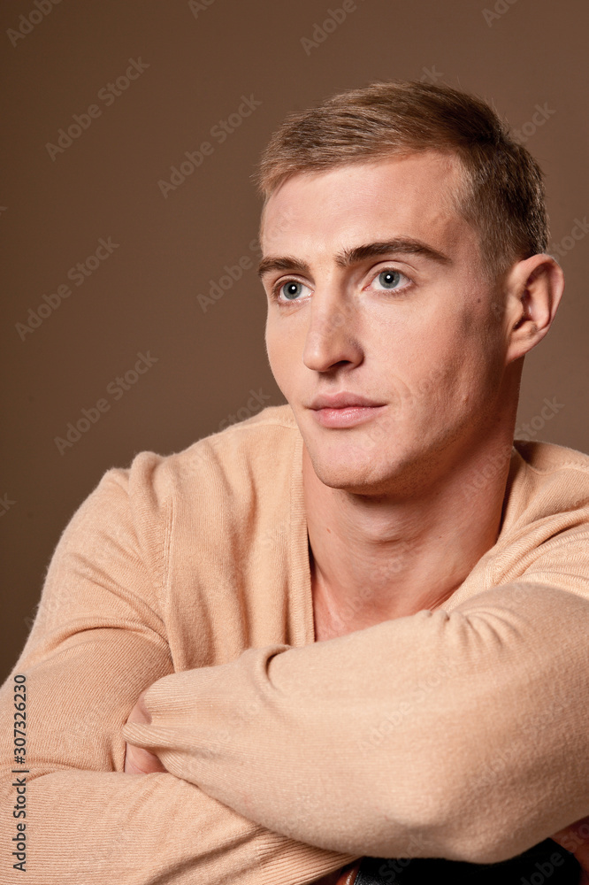 Close up portrait of handsome young man posing in studio Close up portrait of handsome young man posing in studio