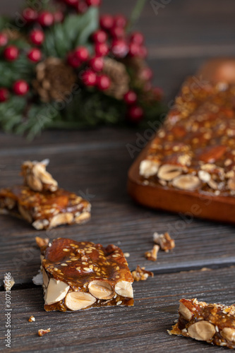 Turron de guirlache, Guirlache nougat made with almond and caramel. Traditional Christmas sweet consumed in Spain. photo