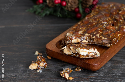 Turron de guirlache, Guirlache nougat made with almond and caramel. Traditional Christmas sweet consumed in Spain.