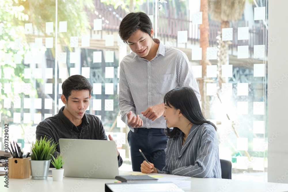 Business working in office with documents and laptop people Consulting and business planning. Business working in office with documents and laptop people Consulting and business planning.