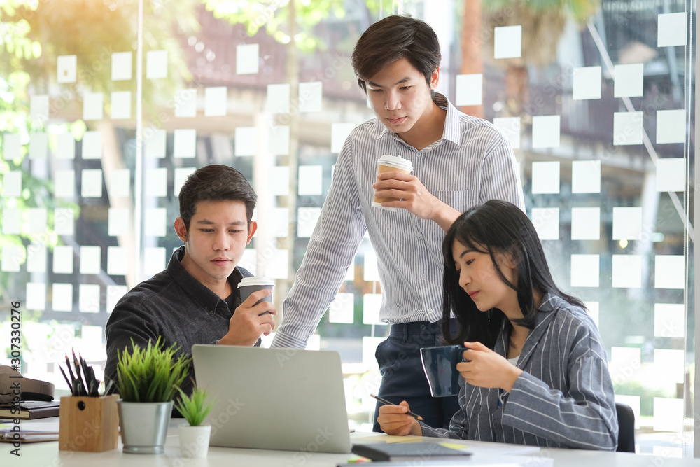 Business working in office with documents and laptop people Consulting and business planning. Business working in office with documents and laptop people Consulting and business planning.