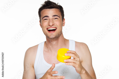 man drinking orange juice isolated on white