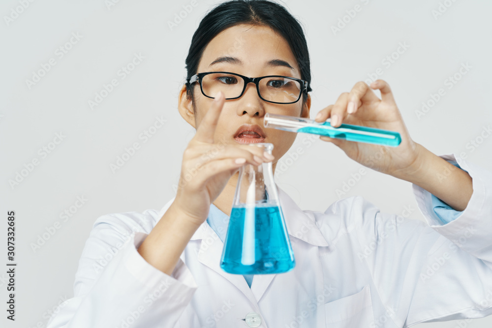 scientist in laboratory with test tubes scientist in laboratory with test tubes