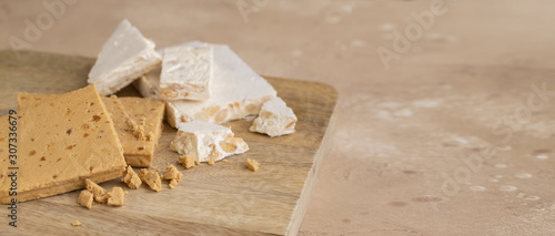 Two types of Turron or hard and soft almond nougat. Traditional Christmas sweet consumed in Spain.Large image for banner with copy space