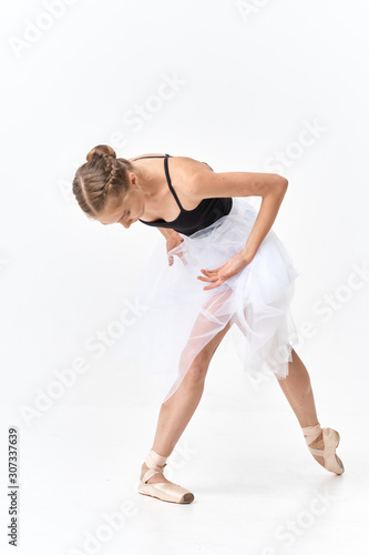 young dancer posing on white background