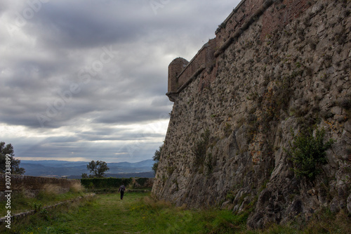 sunbeams through the clouds on the ramparts of the castle