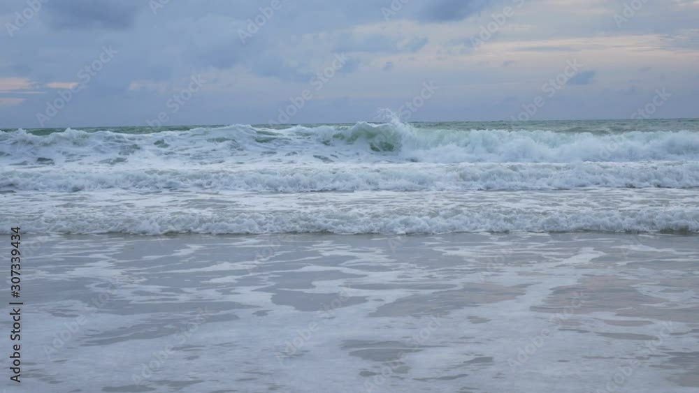 Ocean seascape scenic with large wave crashing on sand beach. Ocean seascape scenic with large wave crashing on sand beach.