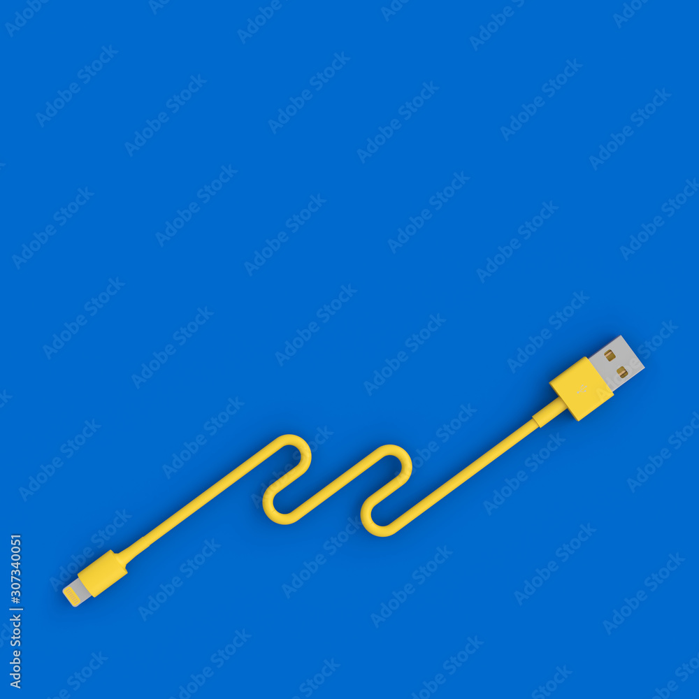 yellow usb cable on blue background in flatlay style. yellow usb cable on blue background in flatlay style.