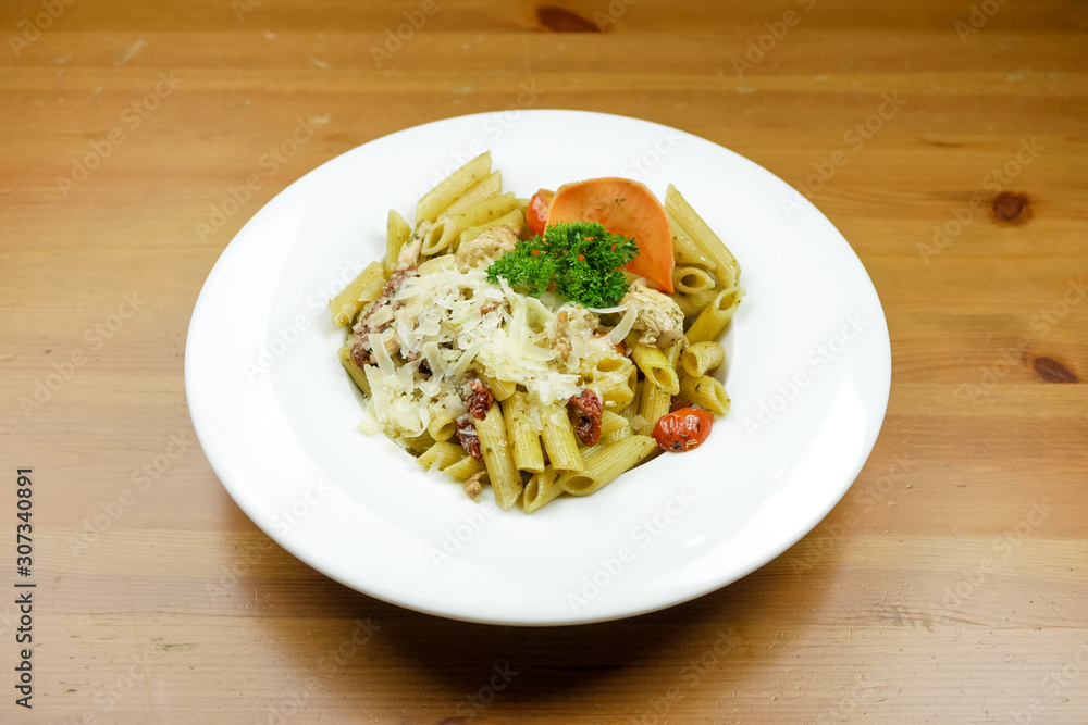 Pasta dish on a restaurant table Pasta dish on a restaurant table