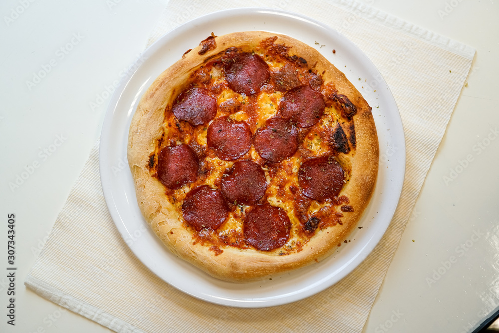 Pizza on a restaurant table Pizza on a restaurant table