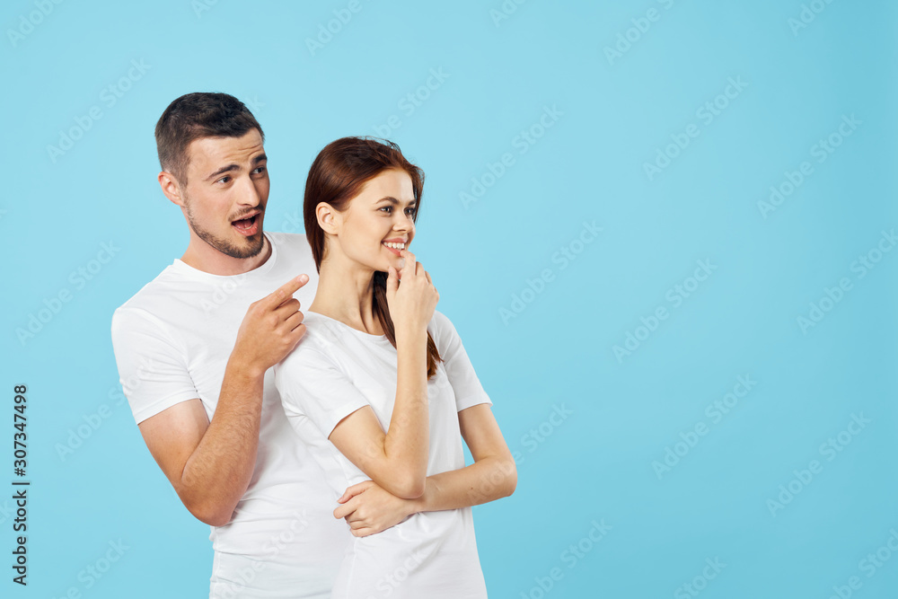Naklejka premium Young couple in t-shirts