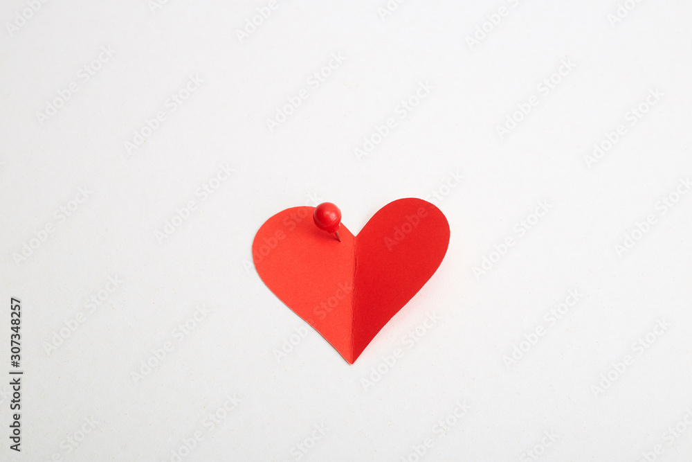 Red heart paper with red pin