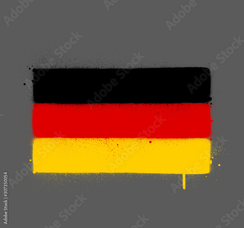graffti Germany flag sprayed over grey