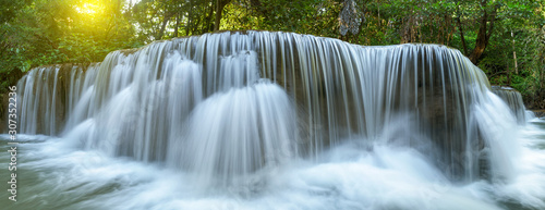 Panoramic beautiful deep forest waterfall in Thailand © yotrakbutda