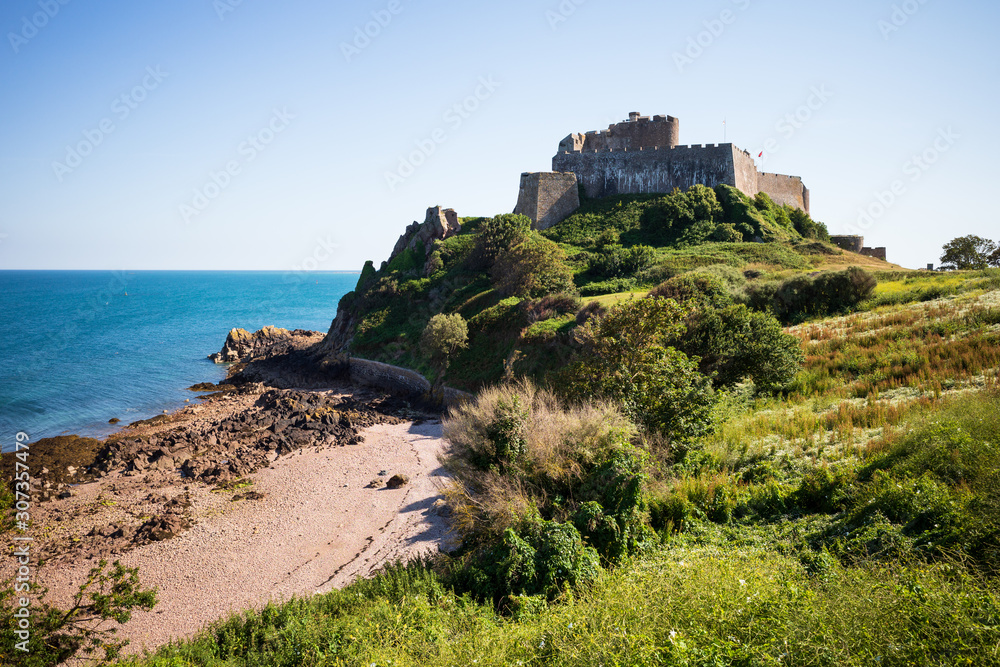 Mont Orgueil Castle and a small bay, which used to provide boat protection and landings for loading and unloading