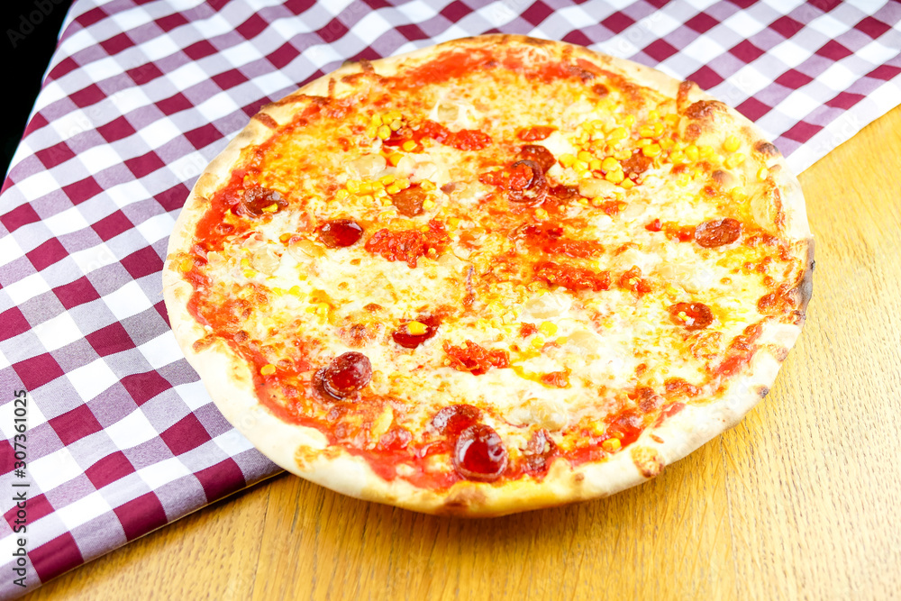 Pizza on a restaurant table Pizza on a restaurant table