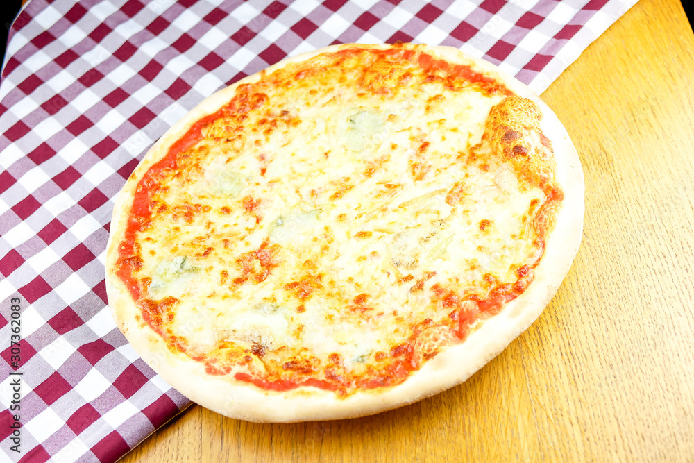 Pizza on a restaurant table Pizza on a restaurant table