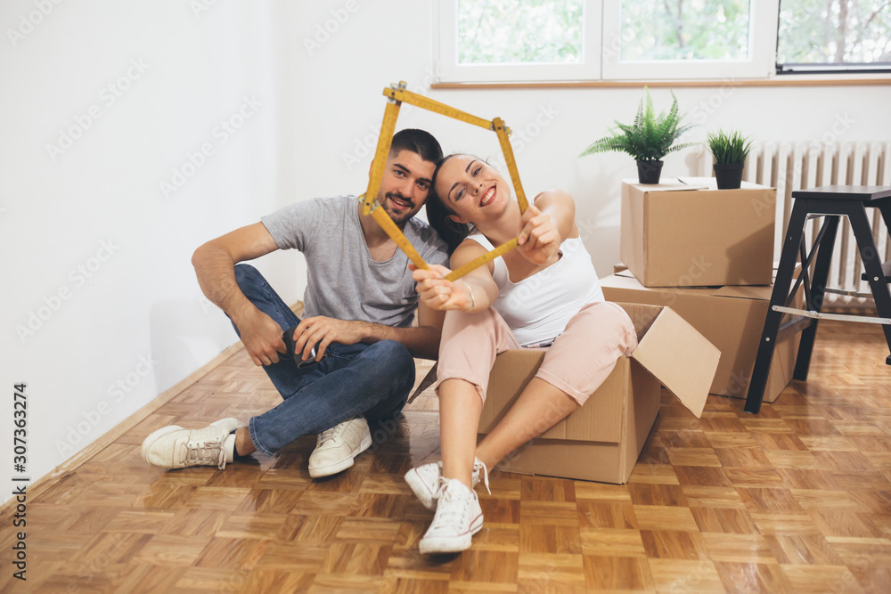 romantic couple moving in their new home romantic couple moving in their new home
