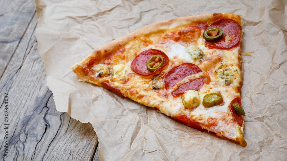 Pizza slices on a restaurant table Pizza slices on a restaurant table
