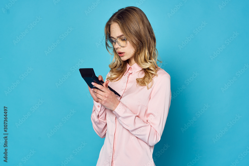 Fototapeta premium young woman with mobile phone