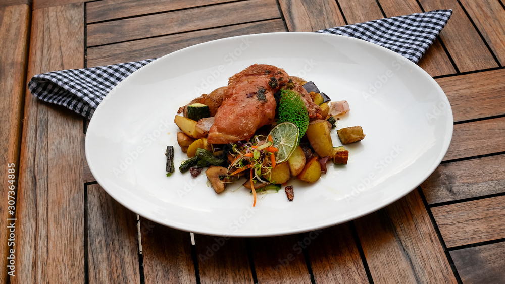Pork dish on a restaurant table Pork dish on a restaurant table