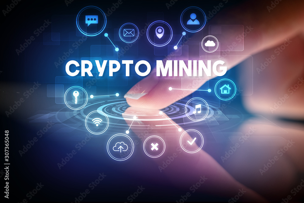 Finger touching tablet with web technology icons and CRYPTO MINING inscription, web technology concept Finger touching tablet with web technology icons and CRYPTO MINING inscription, web technology concept
