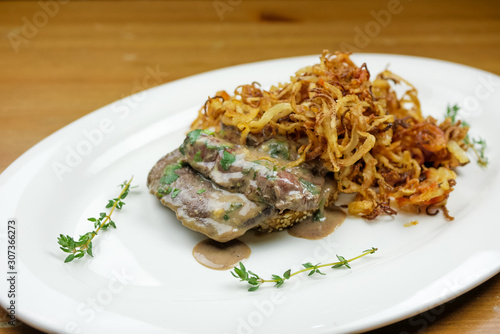 Pork dish on a restaurant table