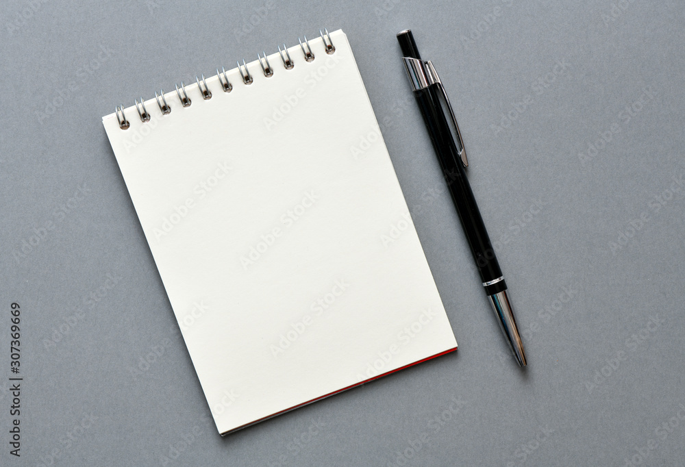 Empty notebook and pen - top view. High resolution photo. Empty notebook and pen - top view. High resolution photo.