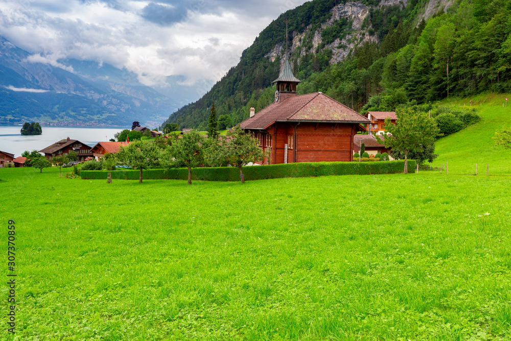 The Swiss village of Iseltwald on the famous lake Brienz. The Swiss village of Iseltwald on the famous lake Brienz.