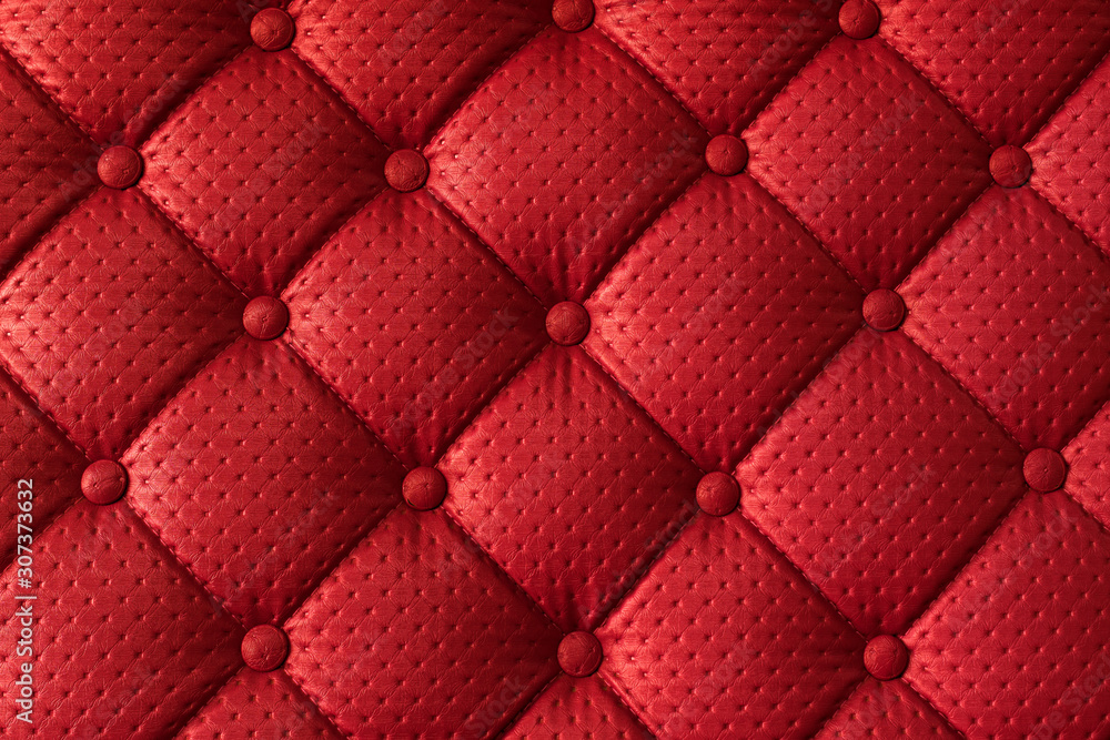 Fototapeta premium Vibrant synthetic leather material with button pattern
