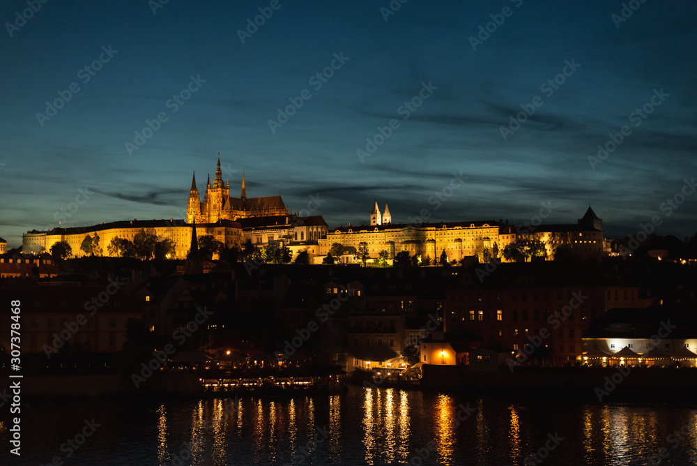 Night panoramic view of Prague Castle, St. Vitus Cathedral and Charles Bridge in Prague