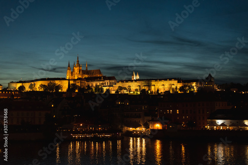 Night panoramic view of Prague Castle  St. Vitus Cathedral and Charles Bridge in Prague