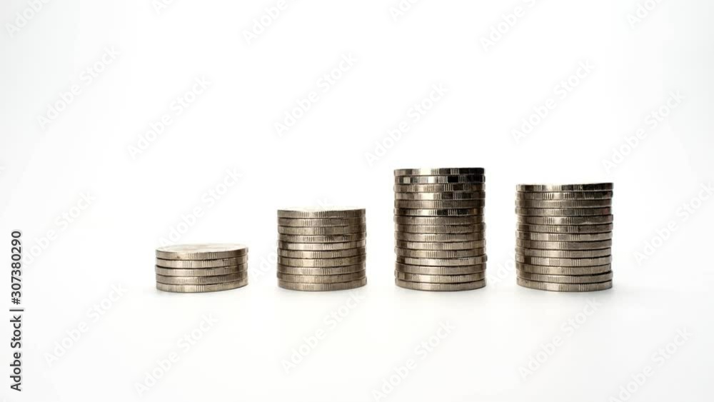 Row of Money to increase investment and profits, 4k Stop motion slider shot. Coins on stack isolated on white background. Row of Money to increase investment and profits, 4k Stop motion slider shot. Coins on stack isolated on white background.