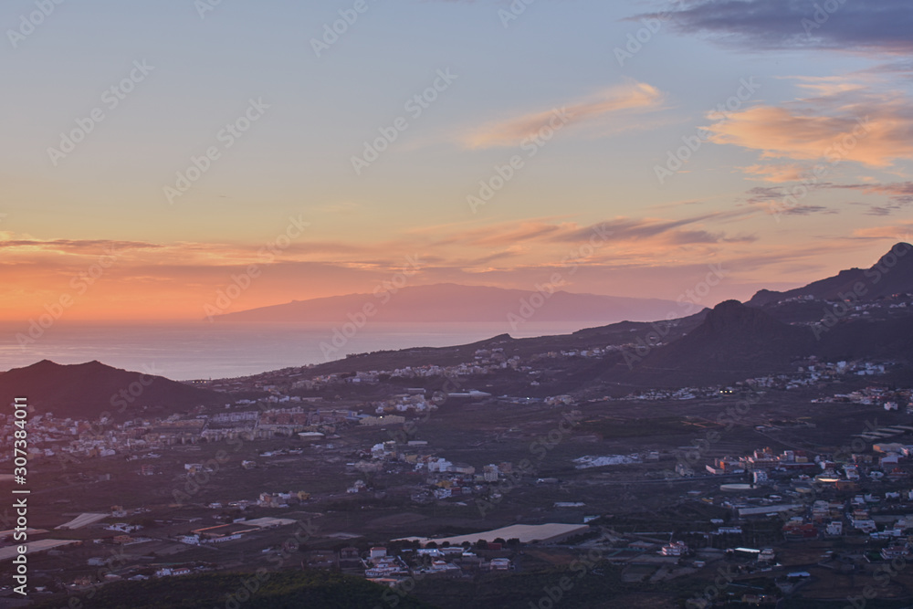 views of the island of La Gomera at sunset from the southern area of Tenerife