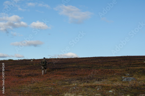 Man bird hunting Northern Norway
