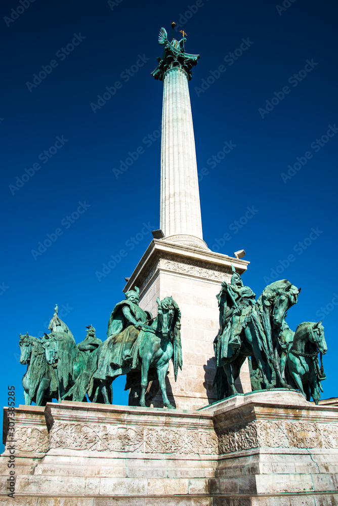 Heroes Square is one of the major squares in Budapest, Hungary, noted for its iconic statue complex featuring the Seven chieftains of the Magyars , as well as the Memorial Stone of Heroes  