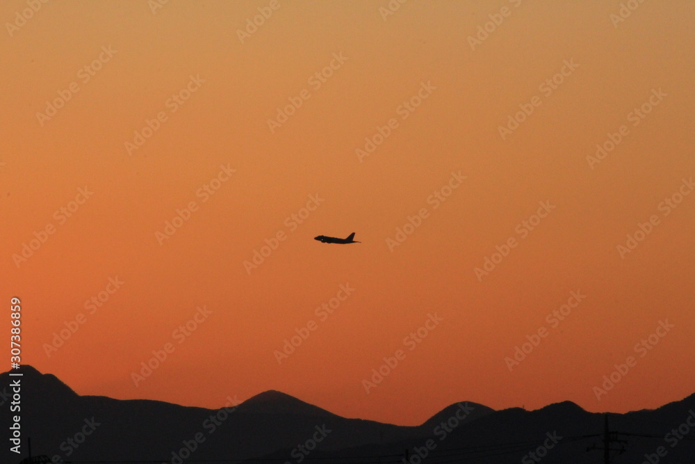 A plane in sunset
